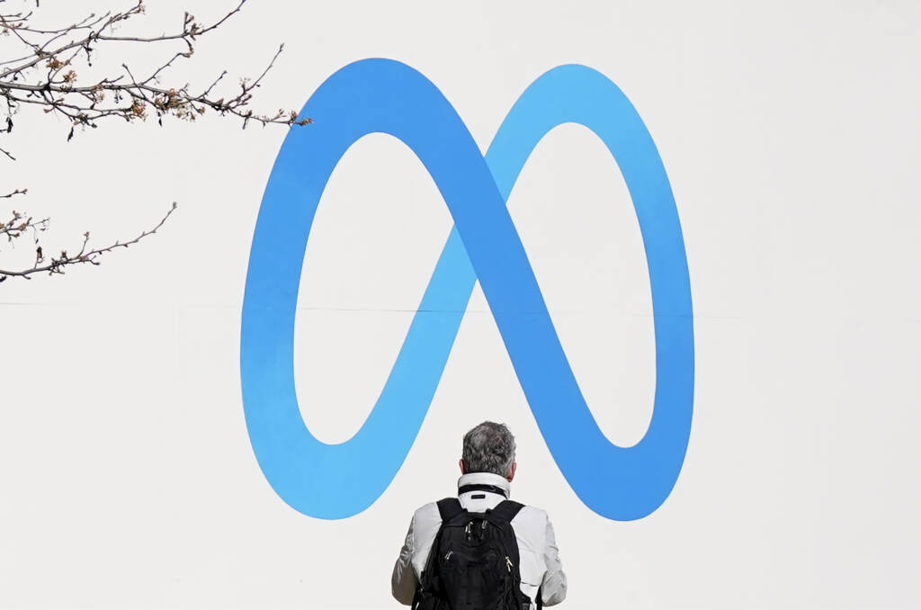 A person stands in front of a Meta sign outside of the company’s headquarters in Menlo Park, Calif. on March 7. A person stands in front of a Meta sign outside of the company's headquarters in Menlo Park, Calif. on March 7. (Jeff Chiu/AP)