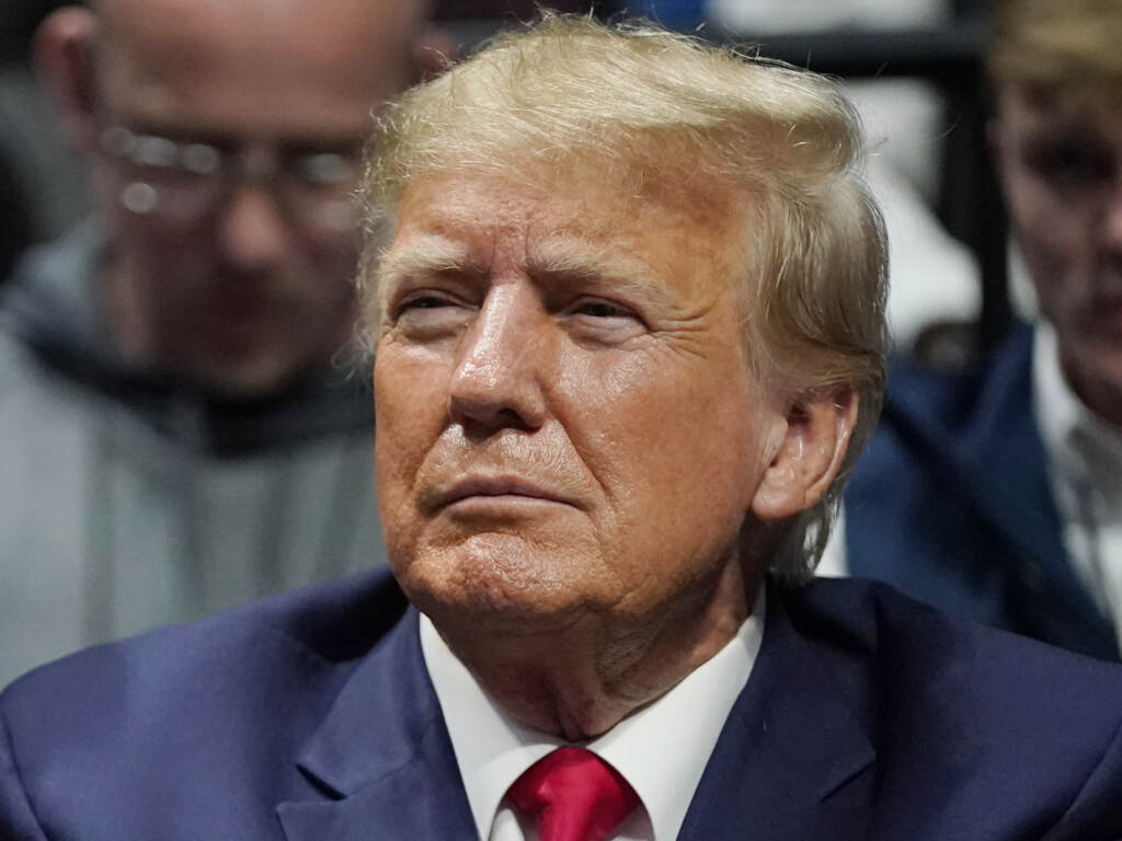 Former President Donald Trump called on his supporters to protest over his social media platform Truth Social last Saturday claiming he will be arrested on bogus charges. Closeup of Donald Trump's face