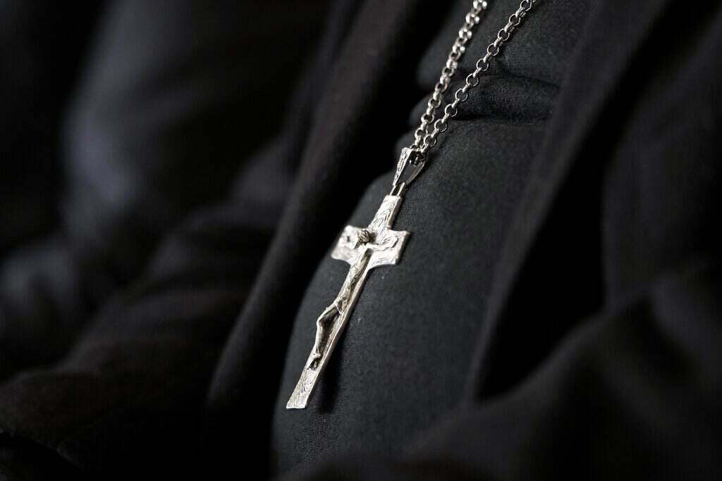 Portugal Church Abuse A close-up of a crucifix worn by a bishop.