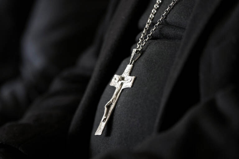 A close-up of a crucifix worn by a bishop.