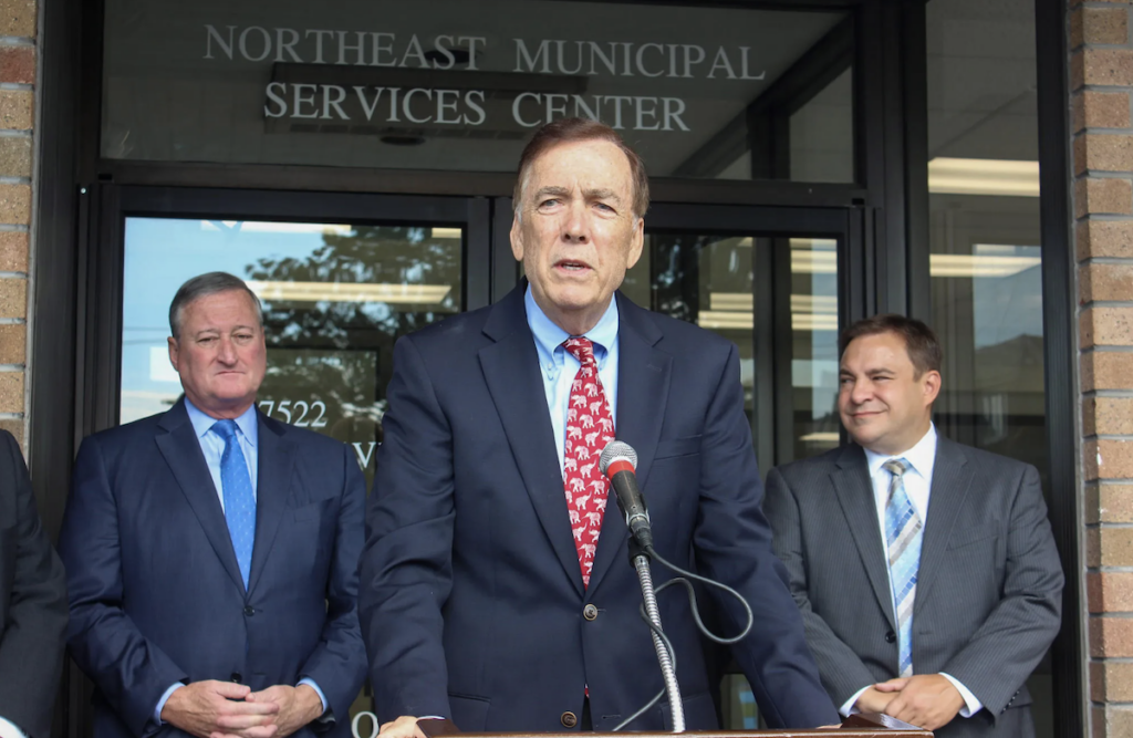 Brian O'Neill speaking at a podium