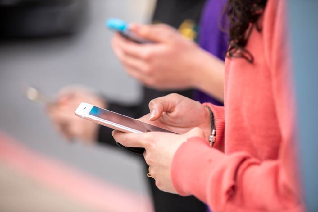 A woman looking at her cell phone