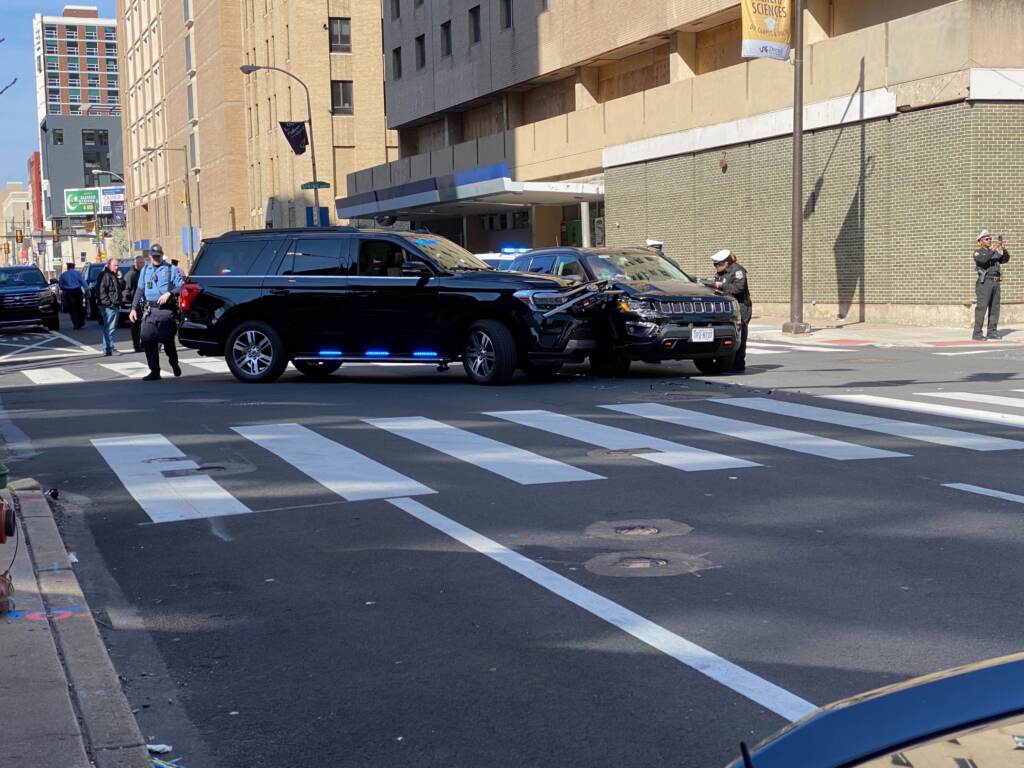 danielle-outlaw-car-crash-a-prihar-2023-03-29-1 Philly police officers at the scene of a crash near 15th and Race streets in Center City, which may have involved PPD Commissioner Danielle Outlaw. (Asha Prihar/Billy Penn)