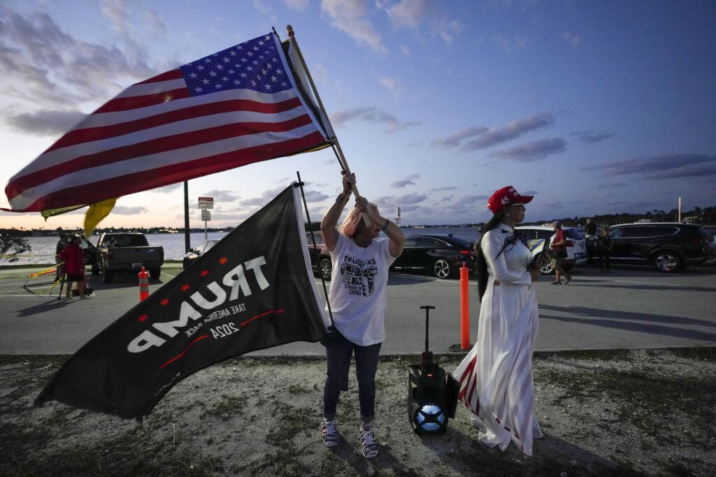 APTOPIX Trump Indicted Trang Le of Orlando, right, and Maria Korynsel of North Palm Beach show their support for former President Donald Trump after the news broke that Trump has been indicted by a Manhattan grand jury, Thursday, March 30, 2023, near Trump's Mar-a-Lago.