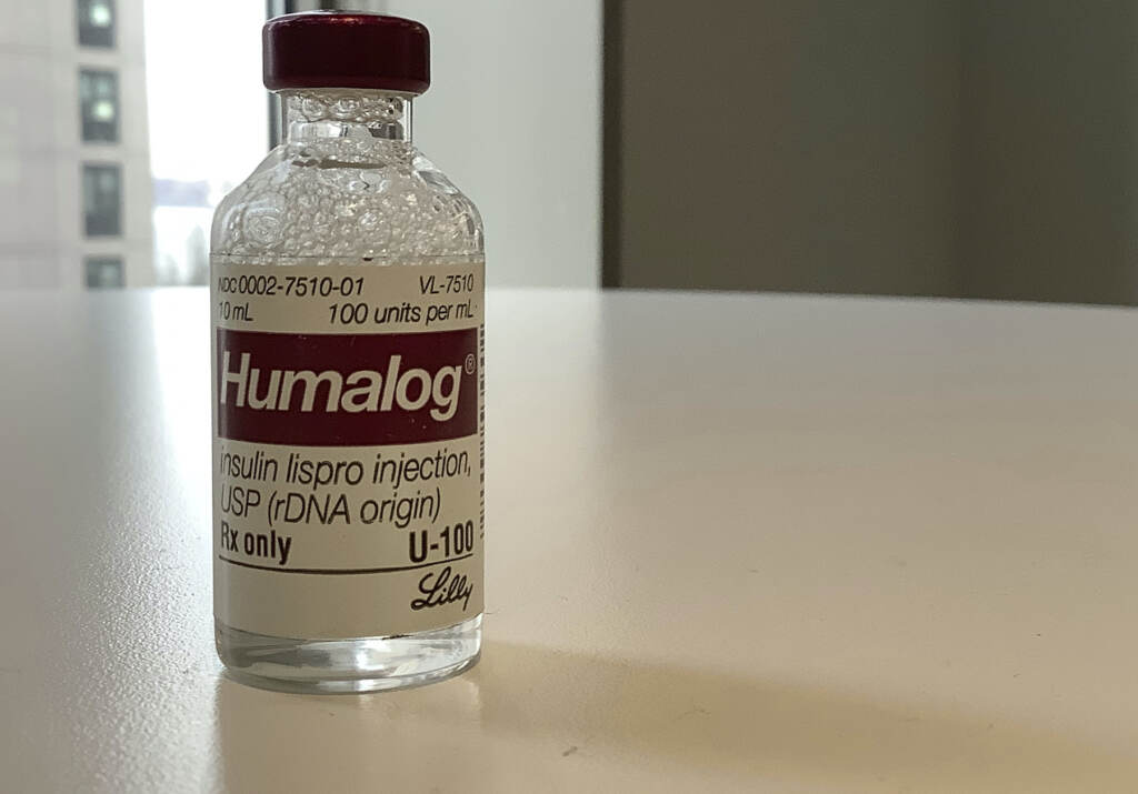 Eli Lilly-Insulin Price Cuts This Wednesday, March 1, 2023 photo shows a vial of Eli Lilly's Humalog insulin in New York. Eli Lilly will cut prices for some older insulins later this year and immediately give more patients access to a cap on costs they pay to fill prescriptions. (AP Photo/Pablo Salinas)