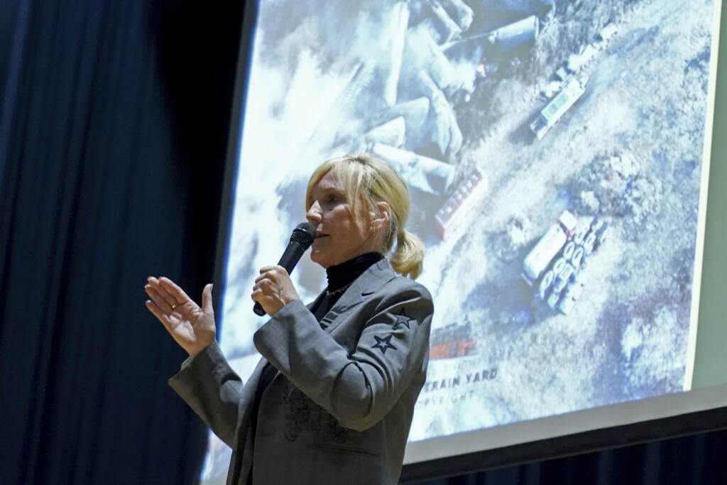 Train Derailment-Ohio Erin Brockovich speaks into a microphone.