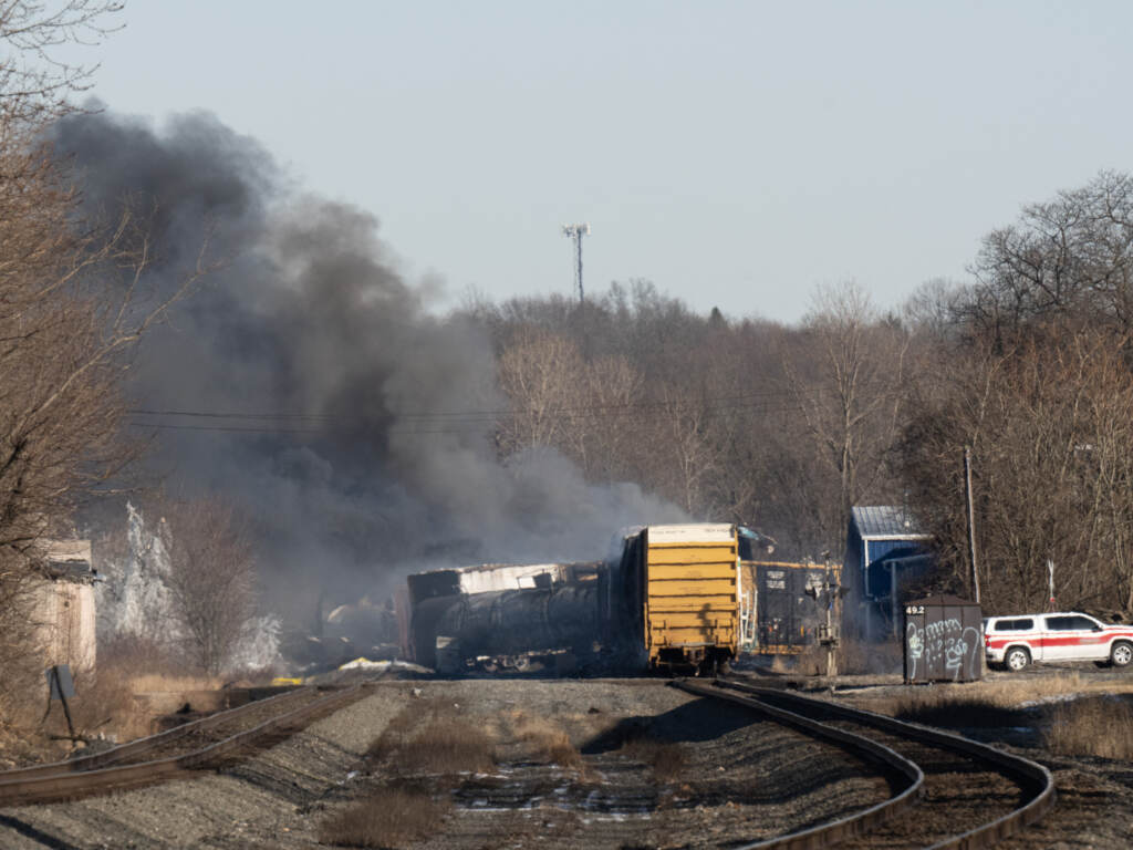 Smoke rises from a derailed cargo train in East Palestine, Ohio, on February 4, 2023. A view of the train derailment in East Palestine, Ohio.