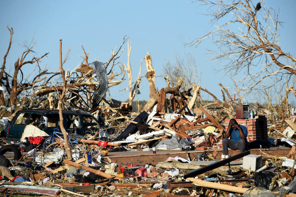 At Least 26 Dead After Devastating Tornadoes Tear Through Mississippi A man sits among the wreckage caused by a series of powerful storms and at least one tornado on March 25, 2023 in Rolling Fork, Mississippi