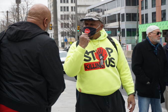 Jamal Johnson talks to someone.