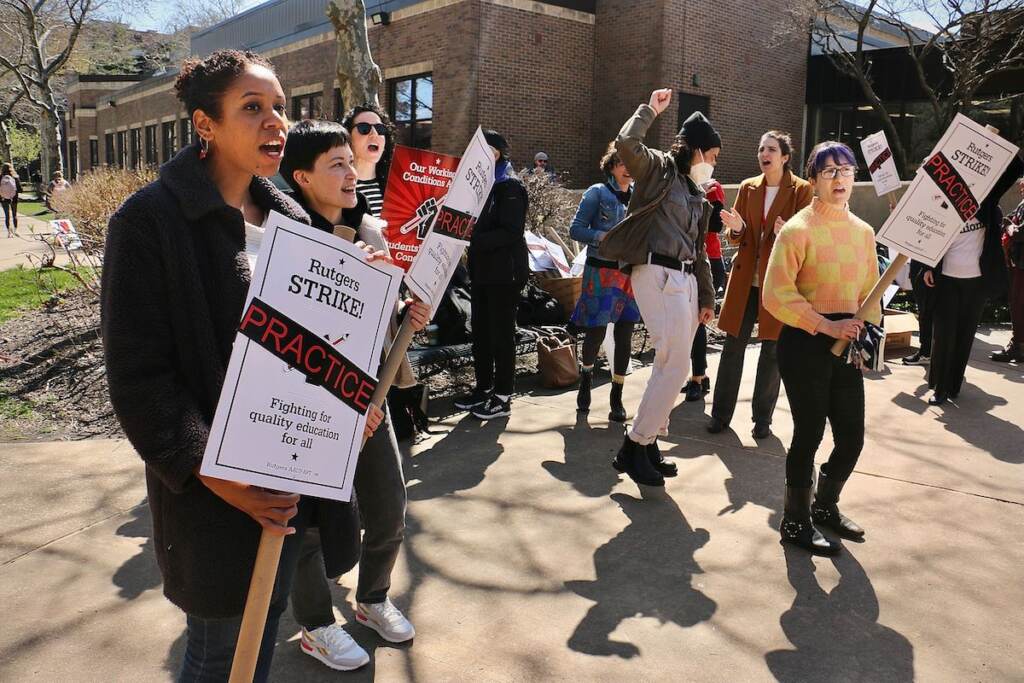 rutgers-strike-1 Faculty and staff hold picket signs on the Camden campus of Rutgers University.