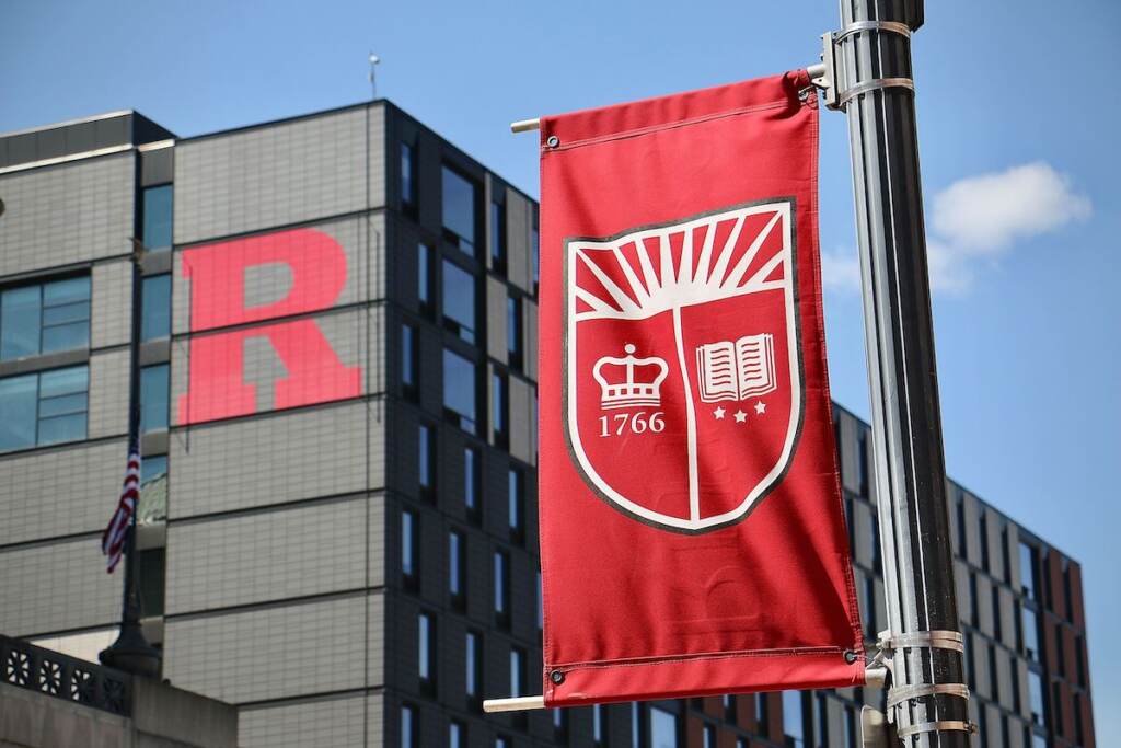 A red banner and a building with a red 