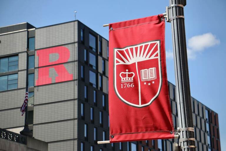 A red banner and a building with a red 