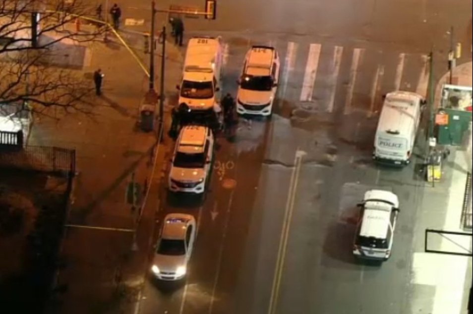 shooting-broad-snyder-septa-stop An aerial view of police cars at Broad and Snyder at night.