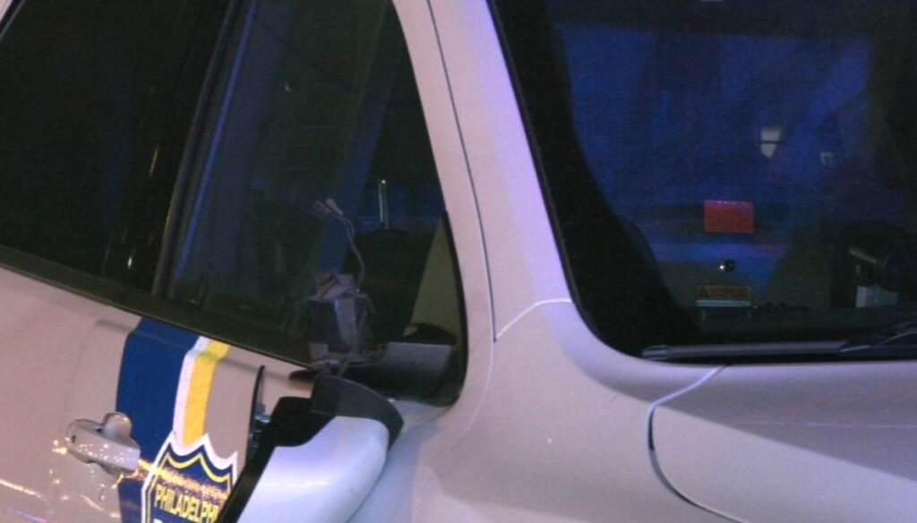 13071065_040223-wpvi-police-cars-vandalized-vid A Philadelphia Police car with it's rear-view mirror detached and other damage.