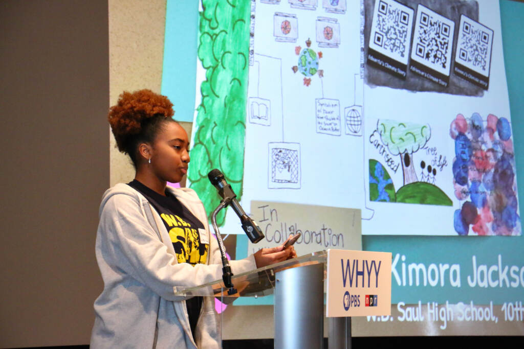 2023 04 26-e lee-kimora jackson-philadelphia whyy-my climate story Kimora Jackson speaks at a podium in front of a presentation.