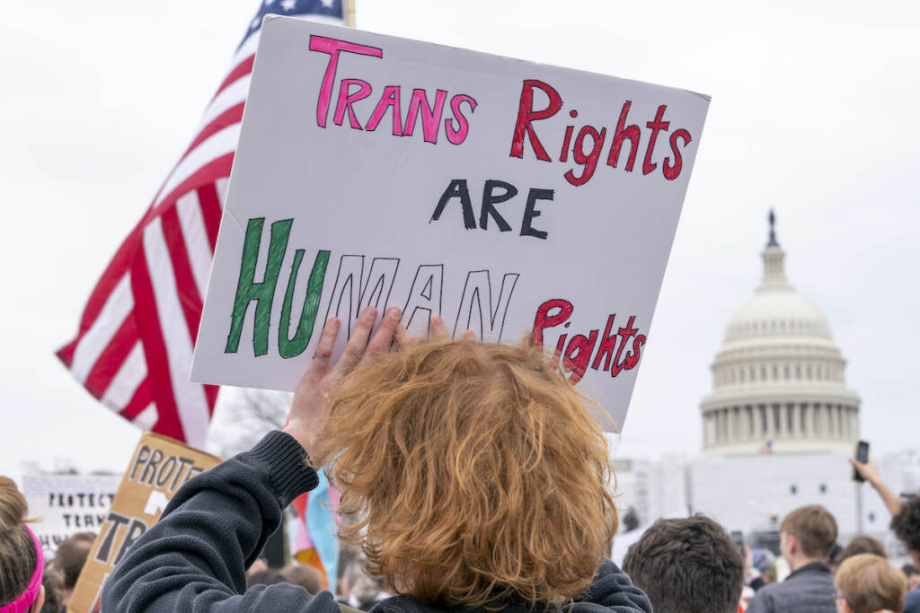 Transgender Athletes People attend a rally as part of a Transgender Day of Visibility, Friday, March 31, 2023, by the Capitol in Washington