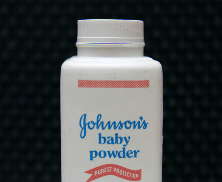 A bottle of Johnson's baby powder is displayed