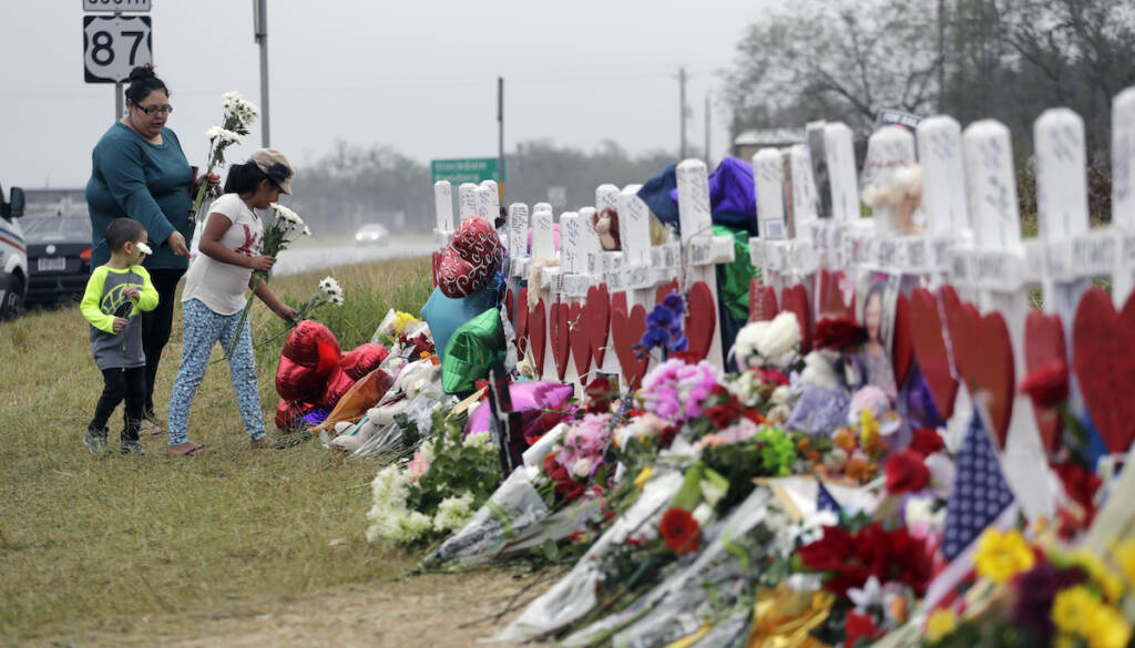 Christina Osborn, Alexander Osborn, Bella Araiza Christina Osborn and her children Alexander Osborn and Bella Araiza visit a makeshift memorial for the victims of the shooting at Sutherland Springs Baptist Church