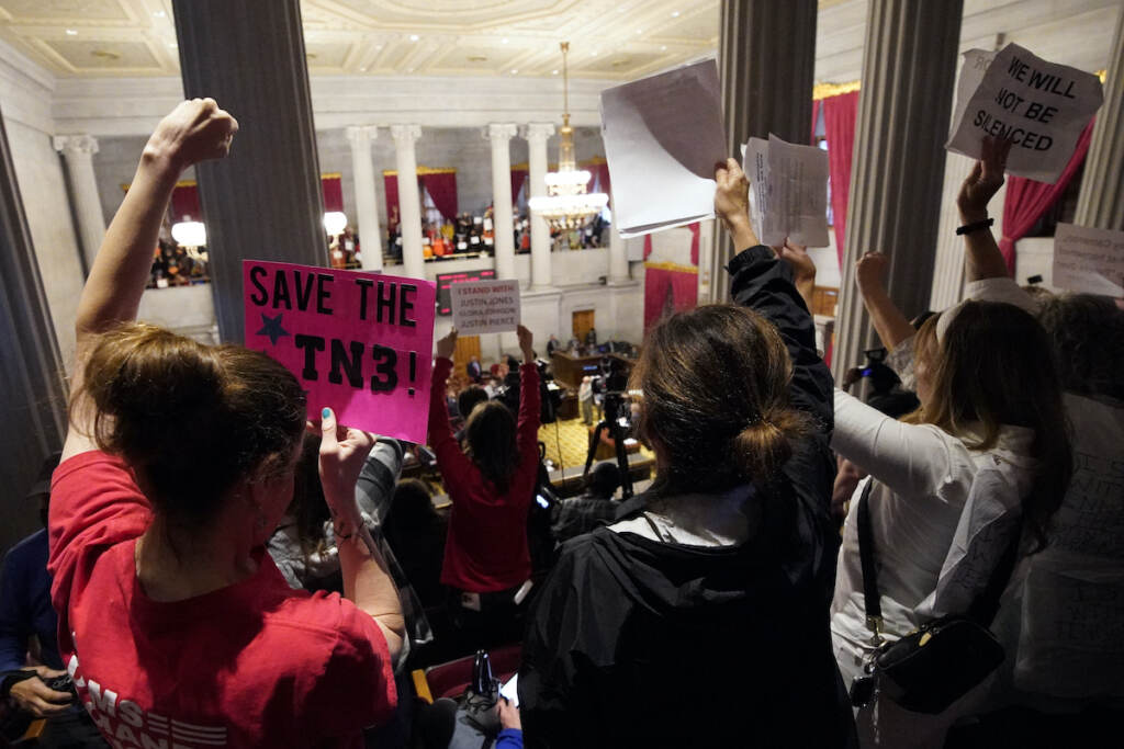 Tennessee Lawmaker Expulsion Gun reform and ''Tennessee Three'' supporters raise signs in the gallery of the House chamber Thursday, April 6, 2023, in Nashville