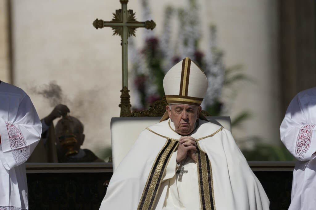 Francis Pope Francis sits on the altar in St. Peter's Square at The Vatican during the Easter Sunday mass