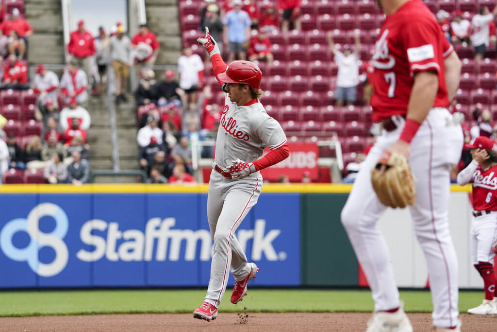 Phillies Reds Baseball05 Philadelphia Phillies' Bryson Stott (center) points to the crowd after hitting a solo home run during the first inning of a baseball game against the Cincinnati Reds, Sunday, April 16, 2023, in Cincinnati
