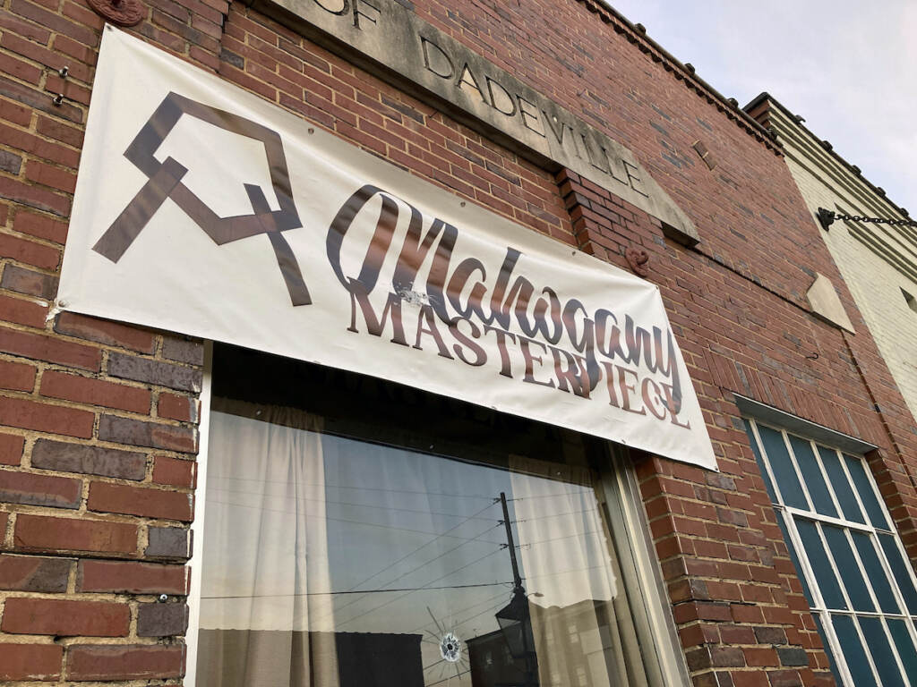 Alabama Shooting A bullet hole is visible in the glass transom over the door at the Mahogany Masterpiece dance studio in Dadeville