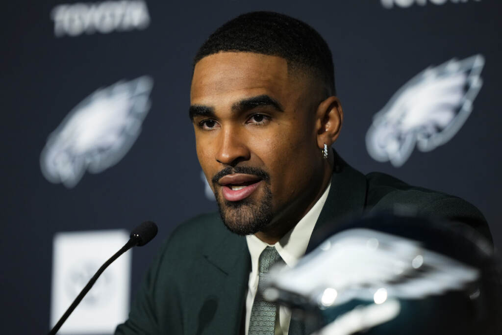 Philadelphia Eagles quarterback Jalen Hurts speaks with members of the media at the NFL football team's training facility in Philadelphia