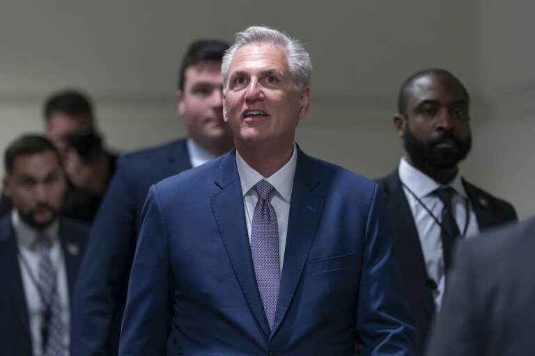 Speaker of the House Kevin McCarthy, R-Calif., arrives for a closed-door meeting with fellow Republicans as he pushes his sweeping debt ceiling package, at the Capitol in Washington