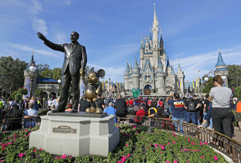 Disney DeSantis File photo: A statue of Walt Disney and Micky Mouse stands in front of the Cinderella Castle at the Magic Kingdom at Walt Disney World in Lake Buena Vista, Fla., Jan. 9, 2019