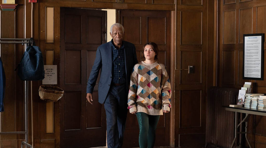 Morgan Freemand and Florence Pugh walking through a door