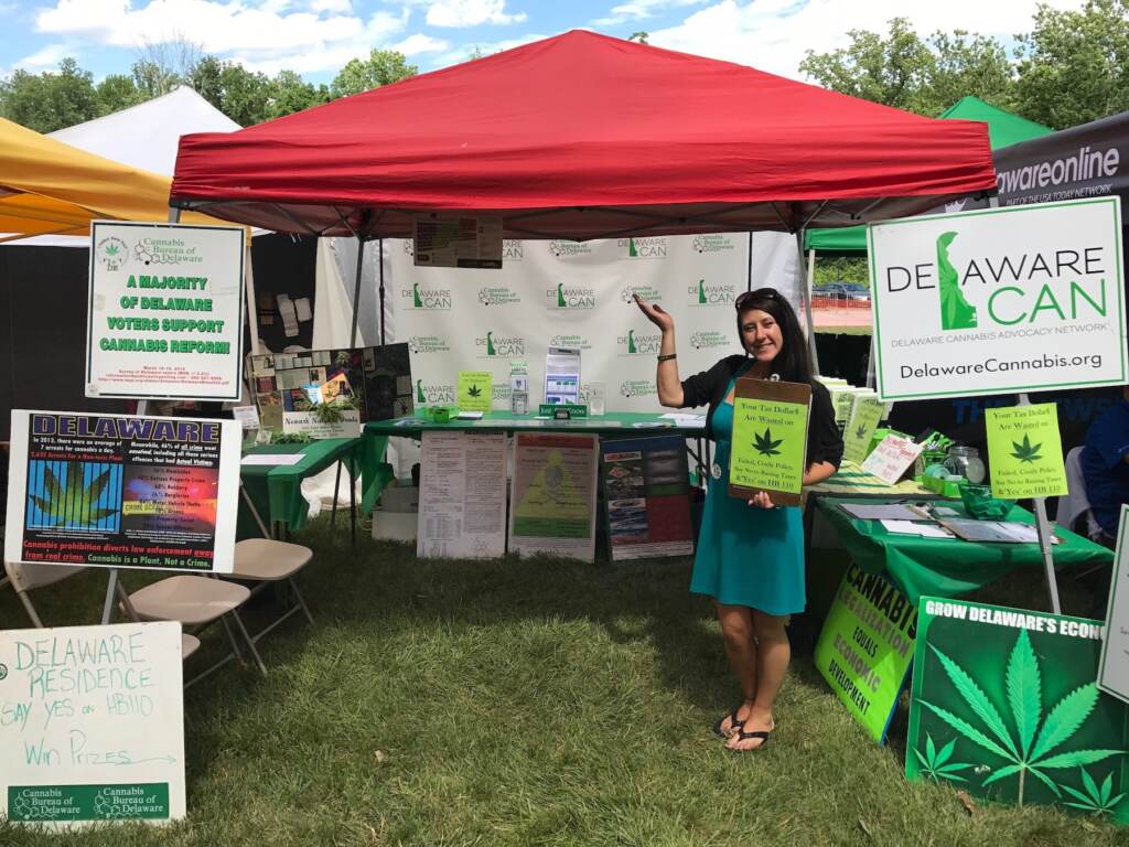 ZOE-delaware-can-2023-04-21 Zoe Patchell poses at an information booth.