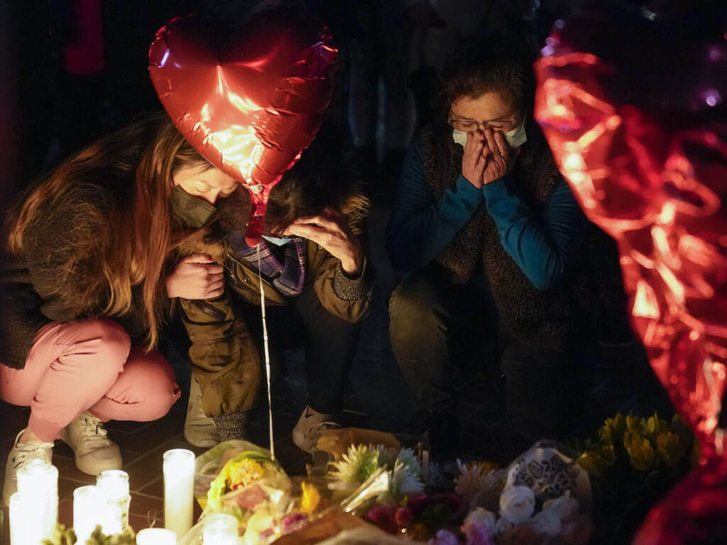 America Gun Violence Giving Up Woman honoring the victims of a shooting at the Star Ballroom Dance Studio
