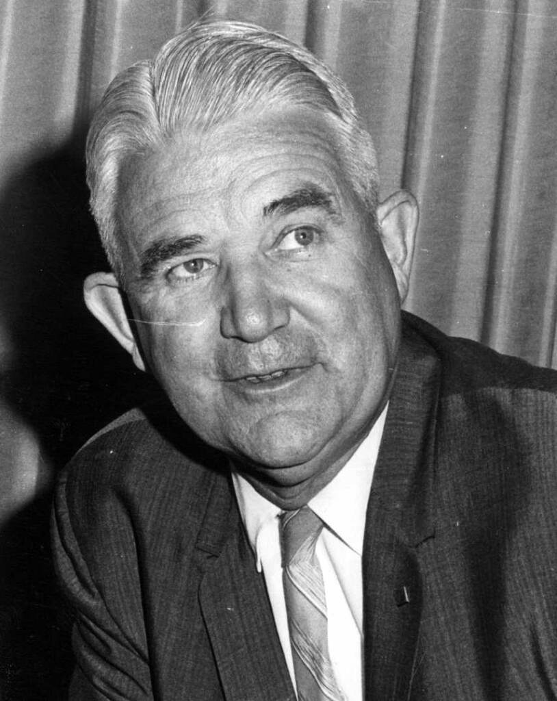 A black-and-white headshot of Samuel Baxter.