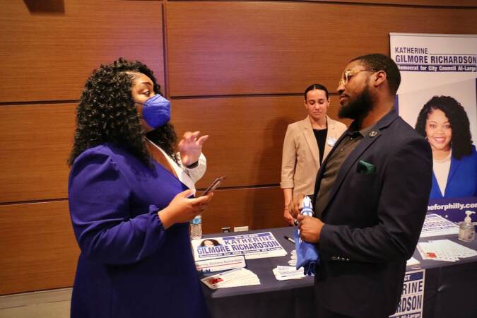 Philadelphia City Council candidate Katherine Gilmore Richardson talks with voters at a candidate convention hosted by WHYY. (Emma Lee/WHYY)