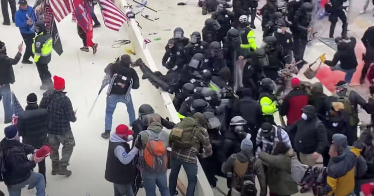 YouTube footage cited in an FBI document reportedly captures Sanford, bottom left, as he hurls an object at Capitol Police. (Youtube)