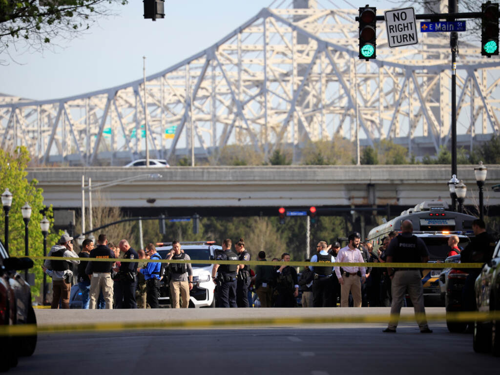 Law enforcement officers respond to an active shooter near the Old National Bank building on Monday in Louisville, Kentucky. The scene after a deadly shooting in Louisville.