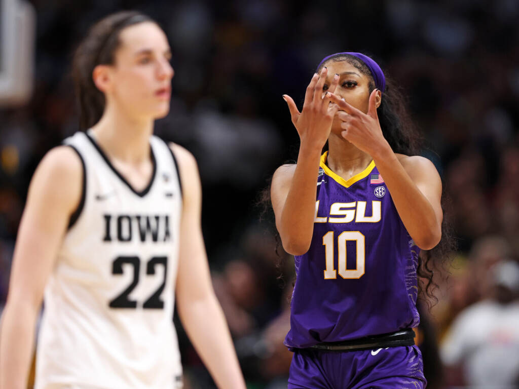 LSU v Iowa Angel Reese of the LSU Tigers gestures towards Caitlin Clark of the Iowa Hawkeyes towards the end of the NCAA Women's Basketball Tournament championship game in Dallas