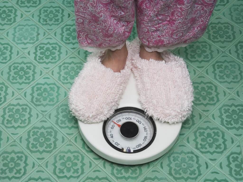 Feet on a weight scale feet on a weight scale