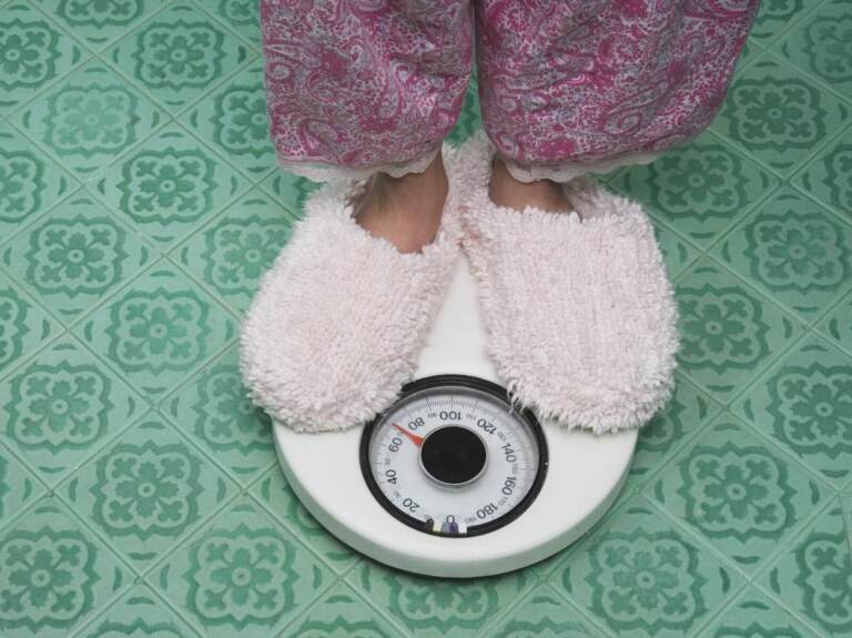 feet on a weight scale
