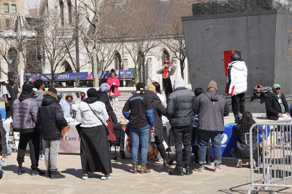 Aziyrah The Poet performs at the rally