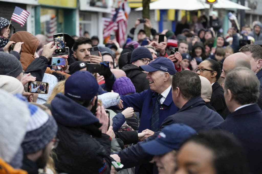 Joe Biden Joe Biden greeting a large group of people