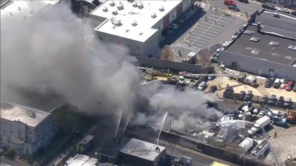 junkyard-fire-hunting-park An aerial view of a junkyard fire.