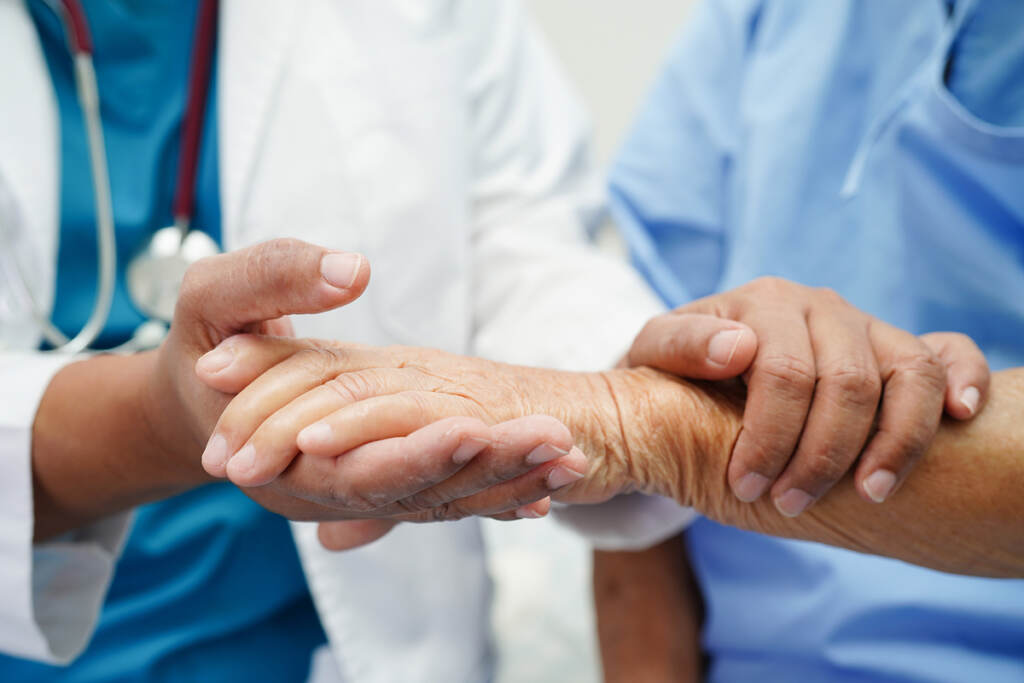 Doctor Holding Hands Asian Elderly Woman Patient, Help And Care Doctor Holding Hands Asian Elderly Woman Patient, Help And Care