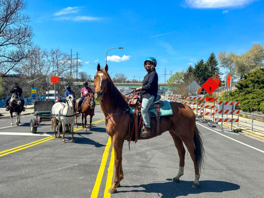 mlkdrivebridge-repairs-fletcherstreetriders-horse-scaled person riding a horse on MLK Drive