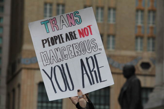 Students made signs to voice support for their transgender peers during a protest at City Hall on Apr. 25, 2023. (Cory Sharber/WHYY)