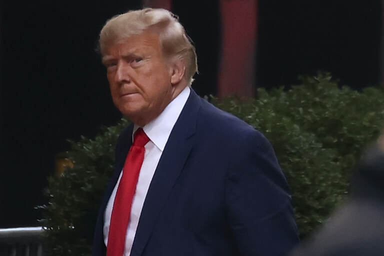 Former President Donald Trump arrives at Trump Tower, Monday, April 3, 2023, in New York. Trump arrived in New York on Monday for his expected booking and arraignment the following day on charges arising from hush money payments during his 2016 campaign. (AP Photo/Yuki Iwamura)