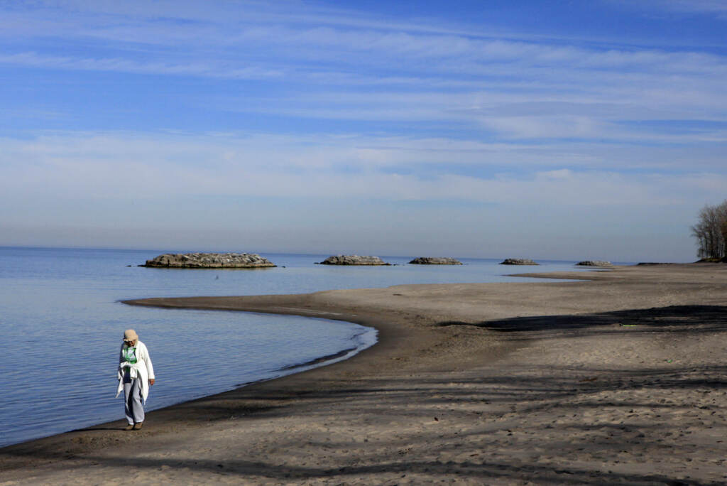 Lake Erie Alice Coughlin of Fairview, Pa. takes a Saturday morning walk along the shore of Lake Erie in Erie, Pa.