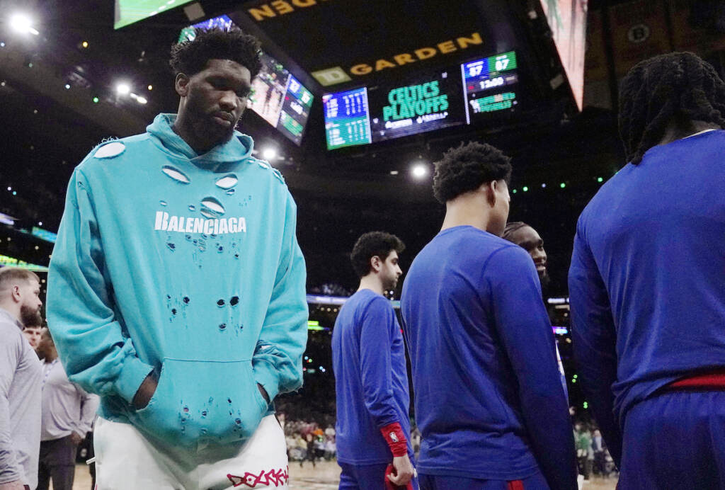 76ers Celtics Basketball Philadelphia 76ers center Joel Embiid (left) walks on the court during the beginning of the second half of Game 1 against the Boston Celtics in the NBA basketball Eastern Conference semifinals playoff series, Monday, May 1, 2023, in Boston