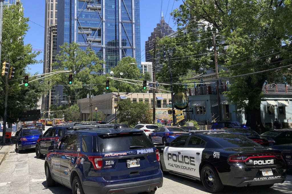 Atlanta-Shooting Emergency vehicles arrive on West Peachtree in Atlanta on Wednesday, May 3, 2023