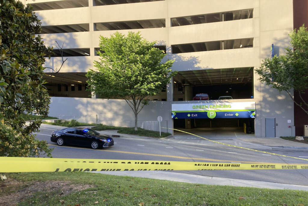 Atlanta Shooting Authorities say a gunman who opened fire, Wednesday, May 3, 2023, at an Atlanta medical facility, killing one, stole a vehicle shortly after the shooting in order to flee from police. The vehicle was later found at a Cobb County parking garage, pictured here on Monday, that is part of the Battery, a mixed-use development near the stadium where the Atlanta Braves play.